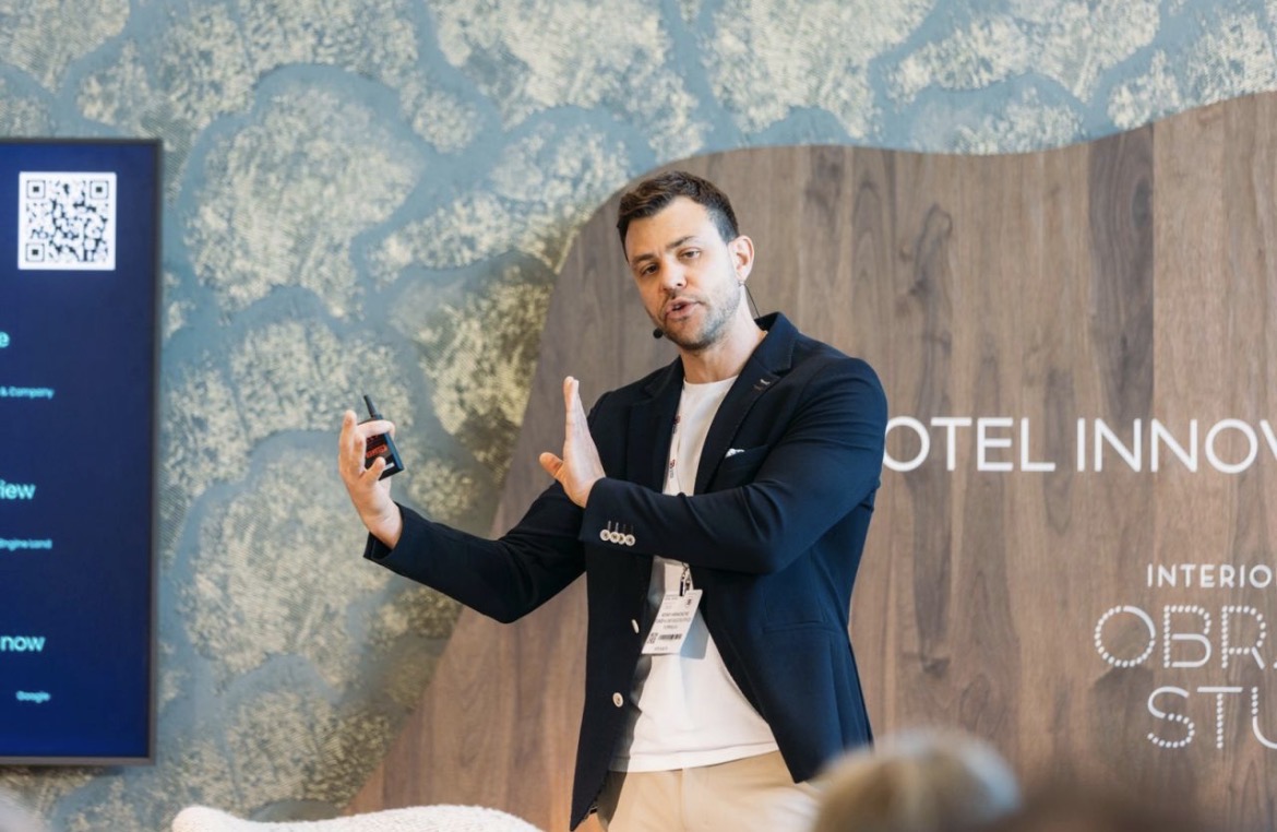 Adam Hamadache delivering a keynote presentation